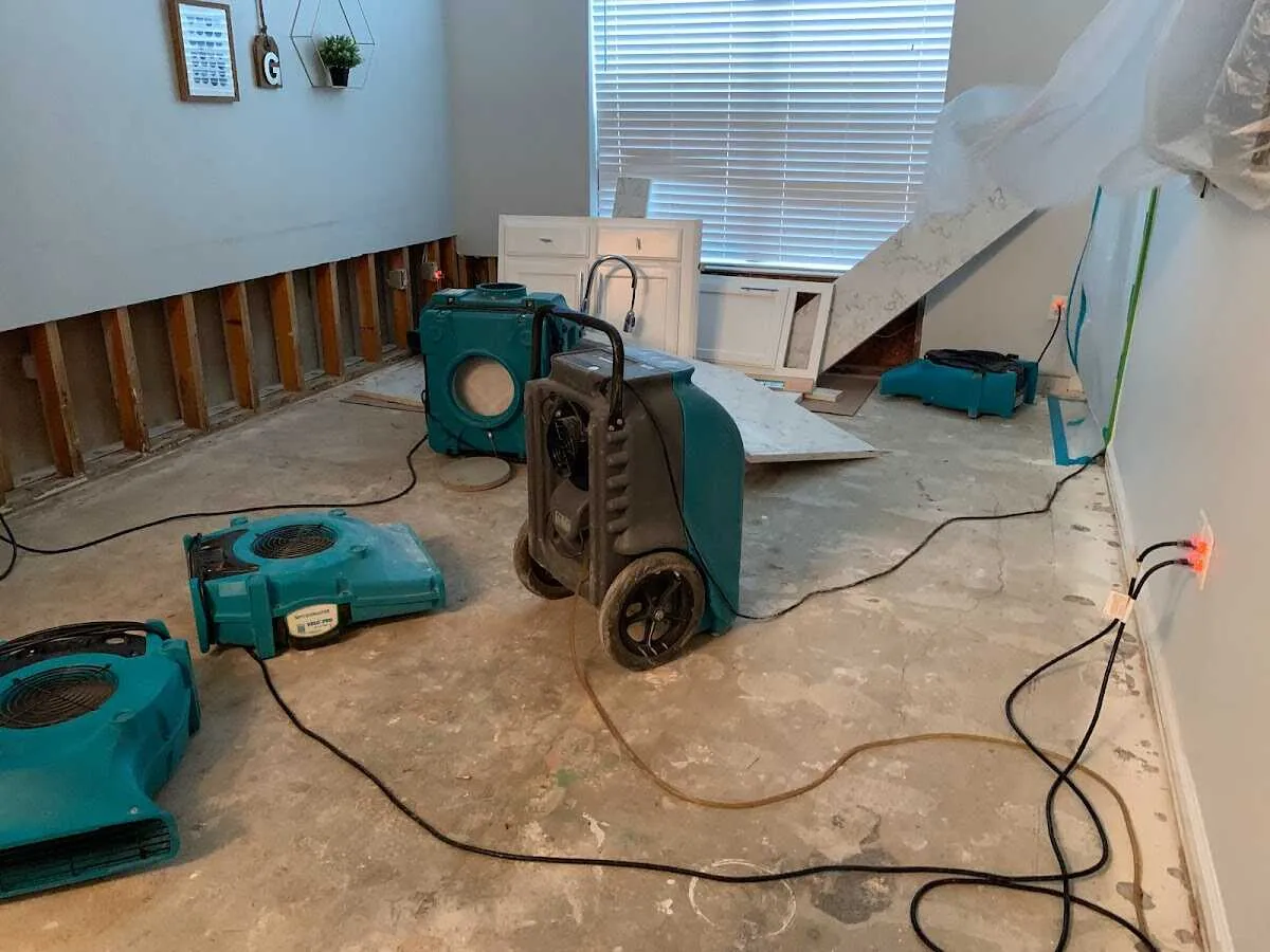 Dehumidifier in flood-cut room for Water Damage Restoration in Kirkland